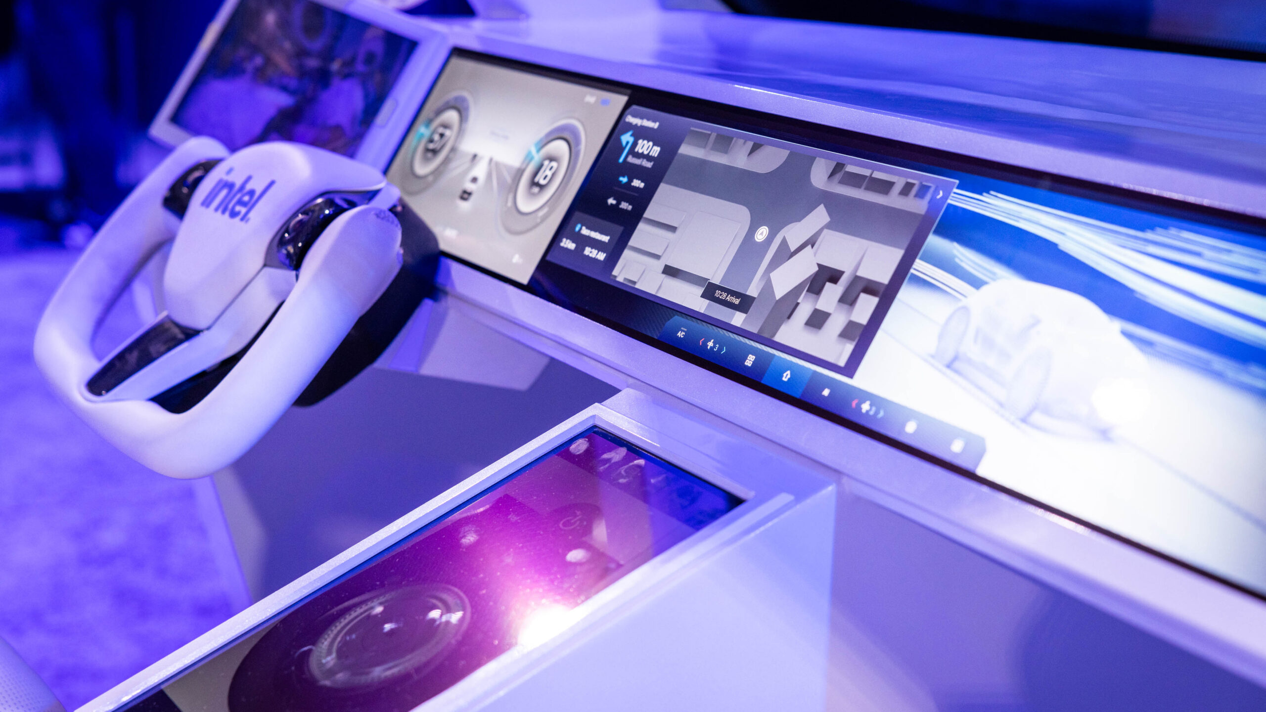 Advanced car dashboard featuring a prominent digital display with navigation and controls, futuristic steering wheel, and touch panel, all set in a sleek, modern design with a blue and purple lighting ambiance.